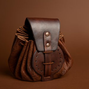 Renaissance belt bag with buckle closure.